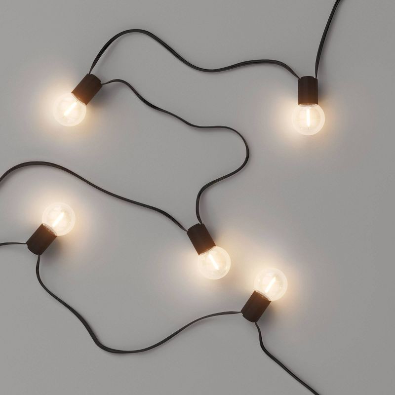 slide 3 of 5, 10ct LED Solar Black Collared Outdoor Orb and Globe String Lights Clear Bulbs with Black Wire - Threshold™: Energy-Efficient Patio Ambiance, 10 ct