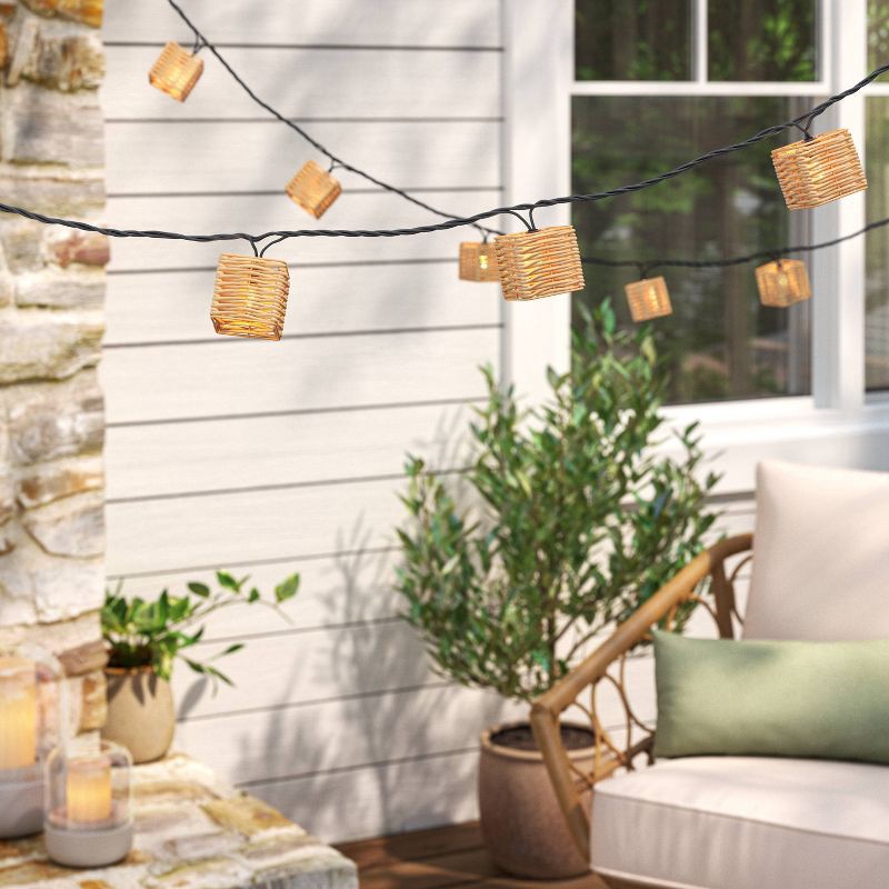 slide 2 of 4, 10ct LED Mini Woven Resin Wicker Indoor Outdoor Lantern String Lights Clear Bulbs with Black Wire - Threshold™, 10 ct