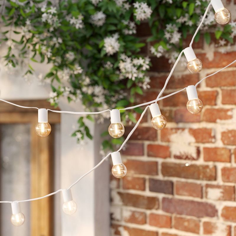 slide 2 of 5, 10ct LED Solar Ivory Collared Outdoor Orb and Globe String Lights Clear Bulbs with White Wire - Threshold™: Solar-Powered, Shatterproof, 10 ct