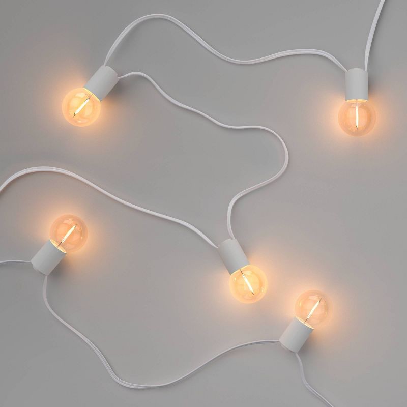 slide 3 of 5, 10ct LED Solar Ivory Collared Outdoor Orb and Globe String Lights Clear Bulbs with White Wire - Threshold™: Solar-Powered, Shatterproof, 10 ct