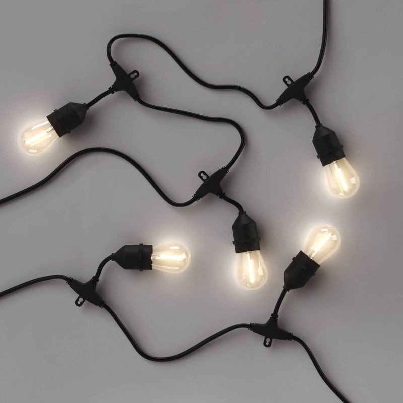 slide 3 of 4, 10ct LED Drop Indoor Outdoor Café String Lights Clear Bulbs with Black Wire - Threshold™: UL Listed, Shatterproof, Electric Powered, 10 ct