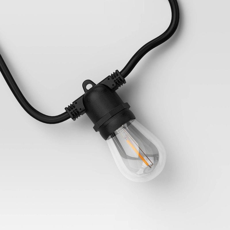 slide 4 of 4, 10ct LED Non-Drop Indoor Outdoor Café String Lights Clear Bulbs with Black Wire - Threshold™: UL Listed, Electric Patio Lighting, 10 ct