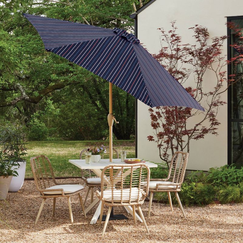 slide 3 of 6, 9' Round Dashed Lines Outdoor Patio Market Umbrella with Faux Wood Pole - Threshold™: Fade-Resistant, Crank Tilt, 1 ct