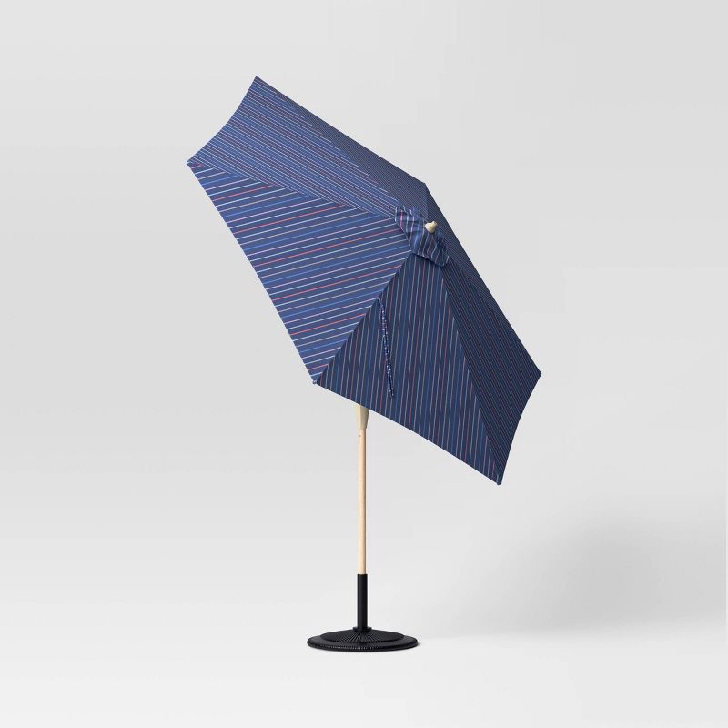 slide 6 of 6, 9' Round Dashed Lines Outdoor Patio Market Umbrella with Faux Wood Pole - Threshold™: Fade-Resistant, Crank Tilt, 1 ct