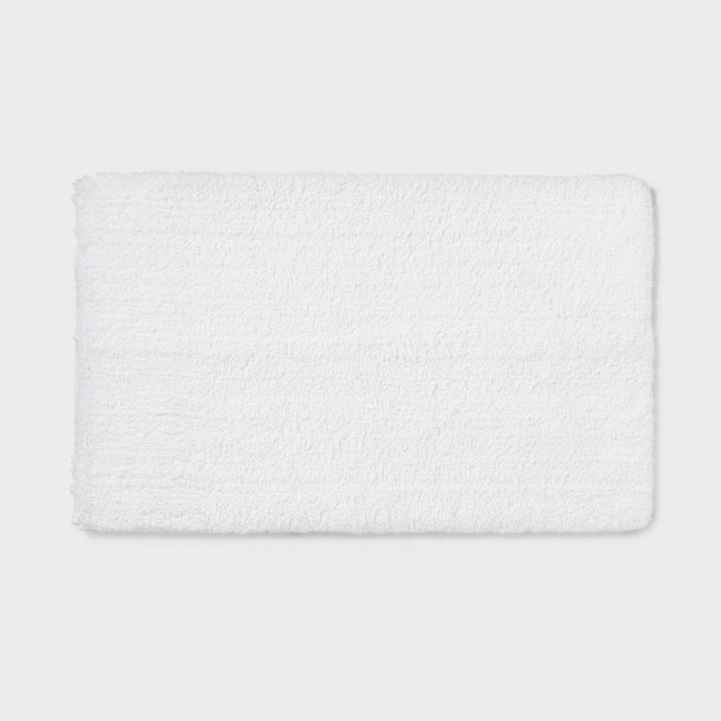 slide 1 of 4, 24"x40" Spa Plush Bath Rug White - Threshold™: Machine Washable, Tufted Polyester, Latex Backing, 1 ct
