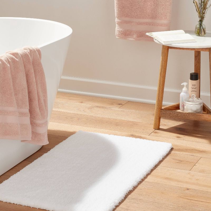 slide 2 of 4, 21"x34" Spa Plush Bath Rug White - Threshold™, 1 ct