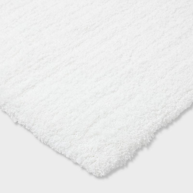 slide 3 of 4, 21"x34" Spa Plush Bath Rug White - Threshold™, 1 ct