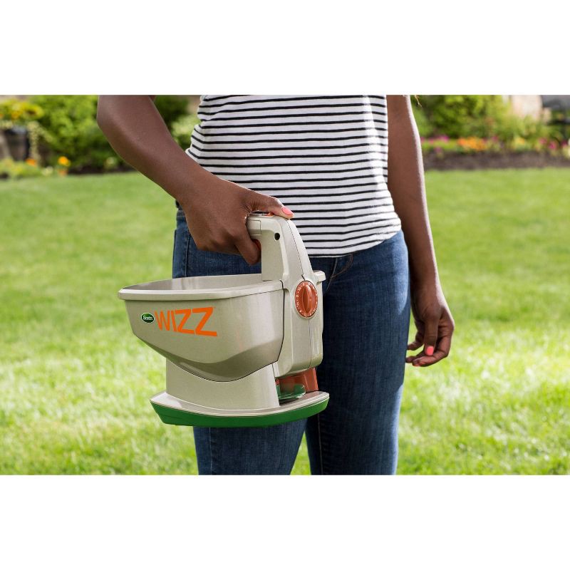 slide 4 of 7, Scotts Wizz Hand-Held Spreader: Battery-Operated Lawn & Garden Fertilizer Distributor, 0.5 Capacity, 1 ct