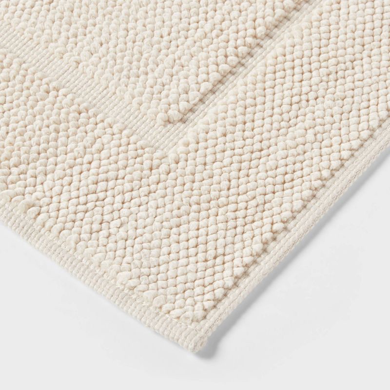 slide 3 of 4, 21"x34" Spa Plush Bath Rug Almond - Threshold™, 1 ct