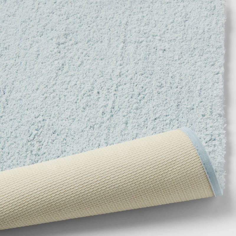 slide 4 of 4, 21"x34" Spa Plush Bath Rug Light Blue - Threshold™: Machine Washable, Tufted Polyester, Latex Backing, 1 ct