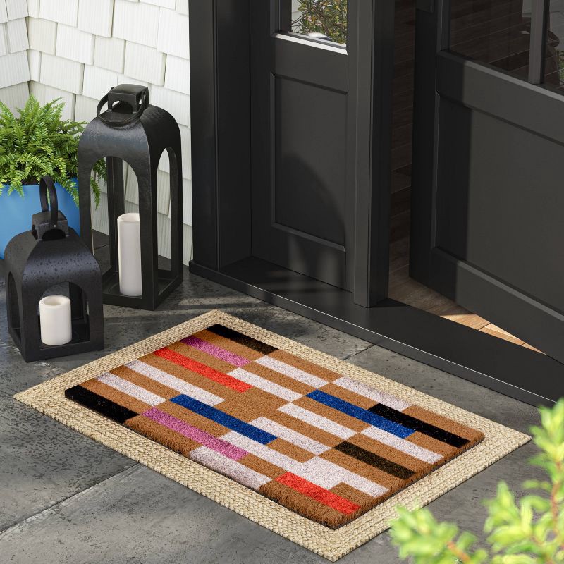 slide 2 of 4, 1'6" x 2'6" Bright Broken Stripe Rectangular Outdoor Door Mat Multicolor - Threshold™ Latex Backed, Shake Clean, 1 ct