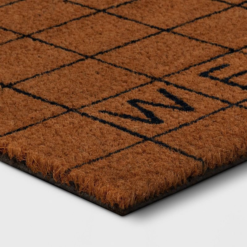 slide 3 of 4, 1'4"x2'4" Welcome Grid Rectangular Outdoor Door Mat Blue - Room Essentials™, 1 ct