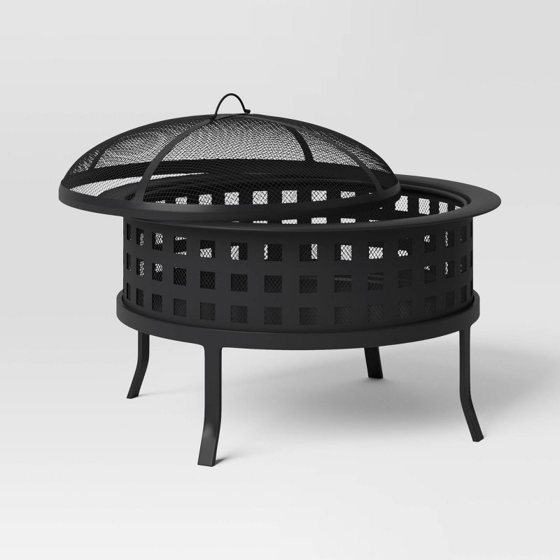 slide 3 of 4, Metal Lattice Wood Burning Round Outdoor Fire Pit Black - Threshold™: Rust-Resistant Steel, Mesh Sides, Angled Legs, 1 ct