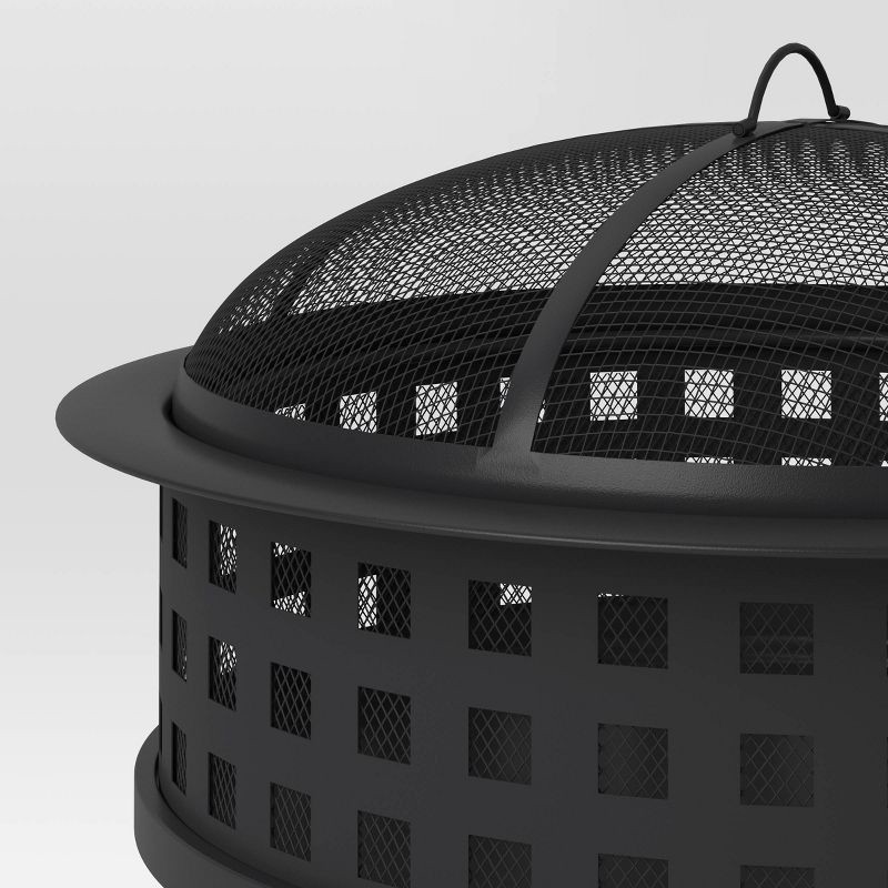 slide 4 of 4, Metal Lattice Wood Burning Round Outdoor Fire Pit Black - Threshold™: Rust-Resistant Steel, Mesh Sides, Angled Legs, 1 ct