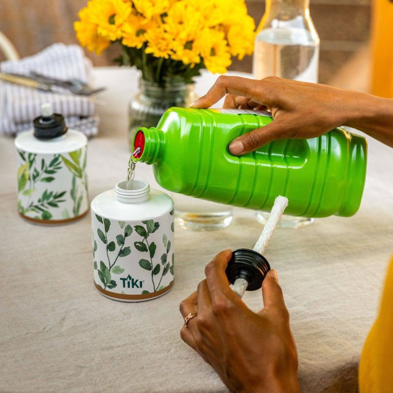 slide 2 of 8, TIKI 5.5" 2pk Ceramic Greenery Outdoor Tabletop Torch Off-White/Green, 2 ct