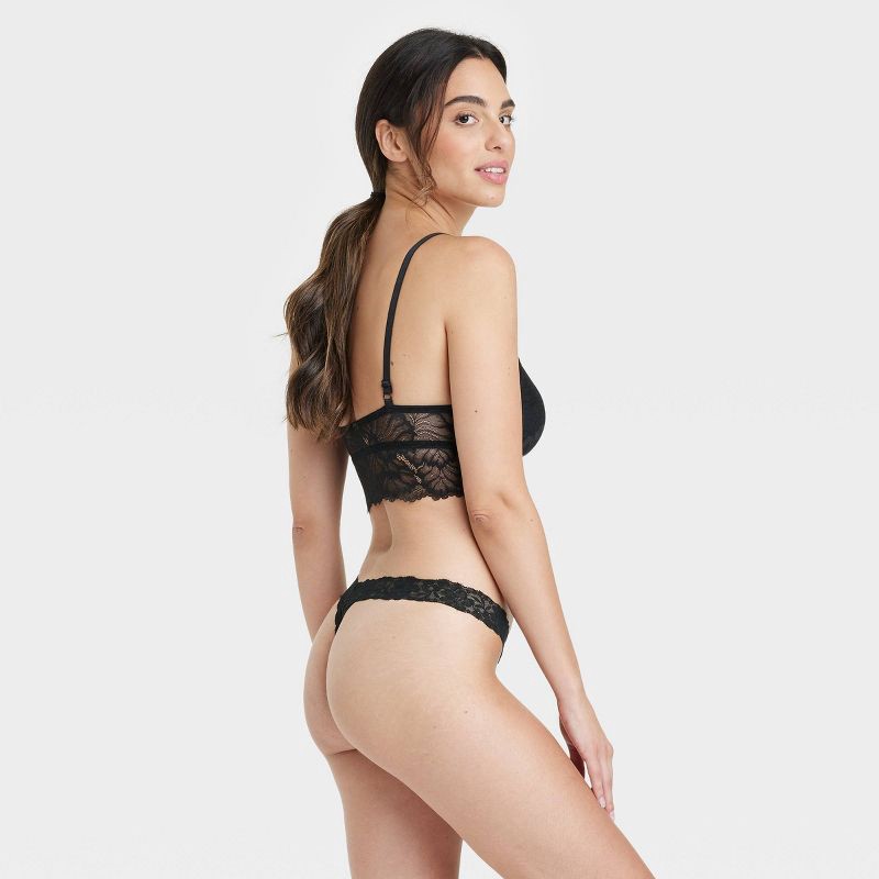 slide 2 of 7, Women's Allover Lace Thong Underwear - Auden™ Black M: Mid Rise, Lightweight, Cotton Gusset, 1 ct