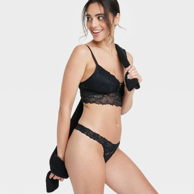 slide 3 of 7, Women's Allover Lace Thong Underwear - Auden™ Black M: Mid Rise, Lightweight, Cotton Gusset, 1 ct