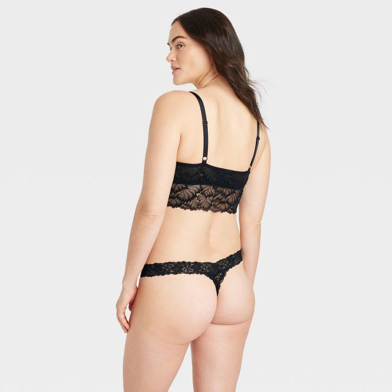 slide 5 of 7, Women's Allover Lace Thong Underwear - Auden™ Black M: Mid Rise, Lightweight, Cotton Gusset, 1 ct