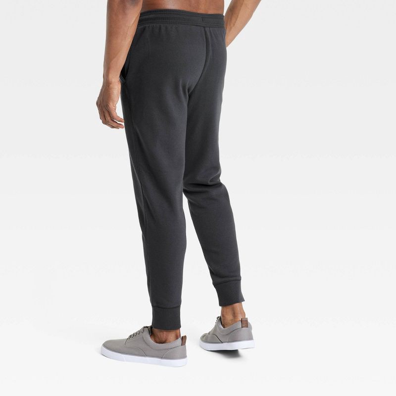slide 2 of 3, Men's Cotton Fleece Jogger Pants - All In Motion™ Black M: Bottoms, Zippered Pocket, 1 ct