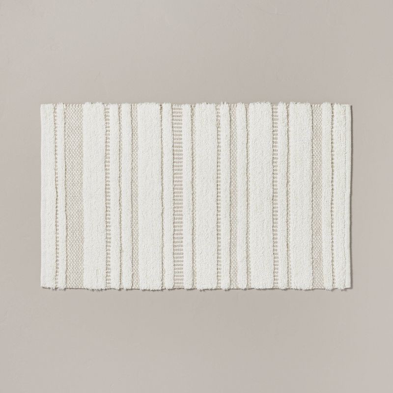 slide 1 of 4, Hearth & Hand with Magnolia 20"x32" Chunky Stripe Bath Rug Cream/Taupe - Hearth & Hand™ with Magnolia: Cotton Woven, Machine Washable, No Backing, 1 ct