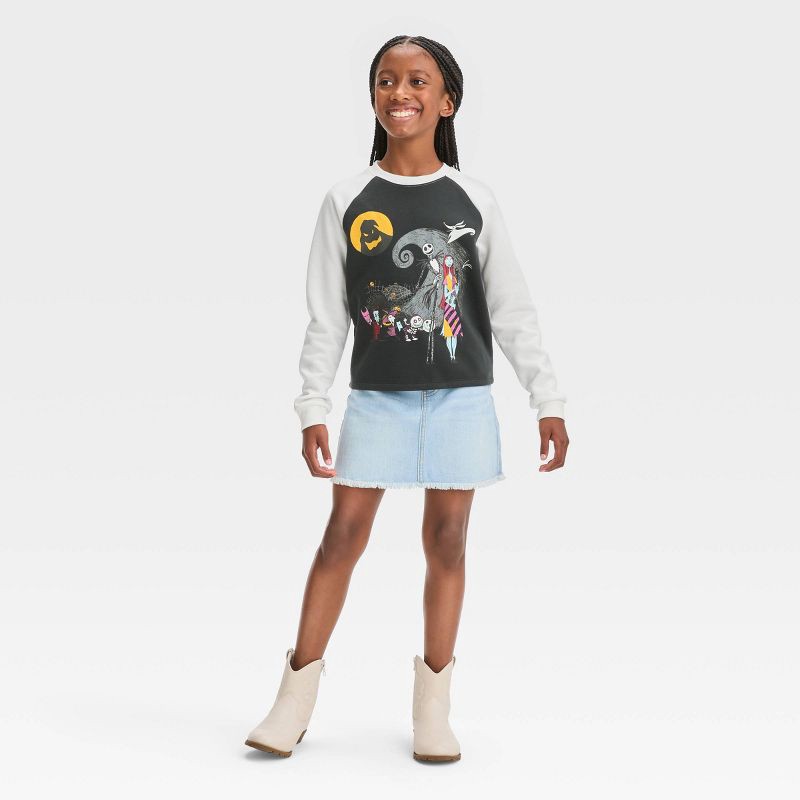 slide 2 of 3, Girls' The Nightmare Before Christmas Raglan Pullover Sweatshirt - Black XS, 1 ct