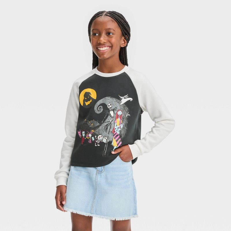 slide 1 of 3, Girls' The Nightmare Before Christmas Raglan Pullover Sweatshirt - Black XS, 1 ct