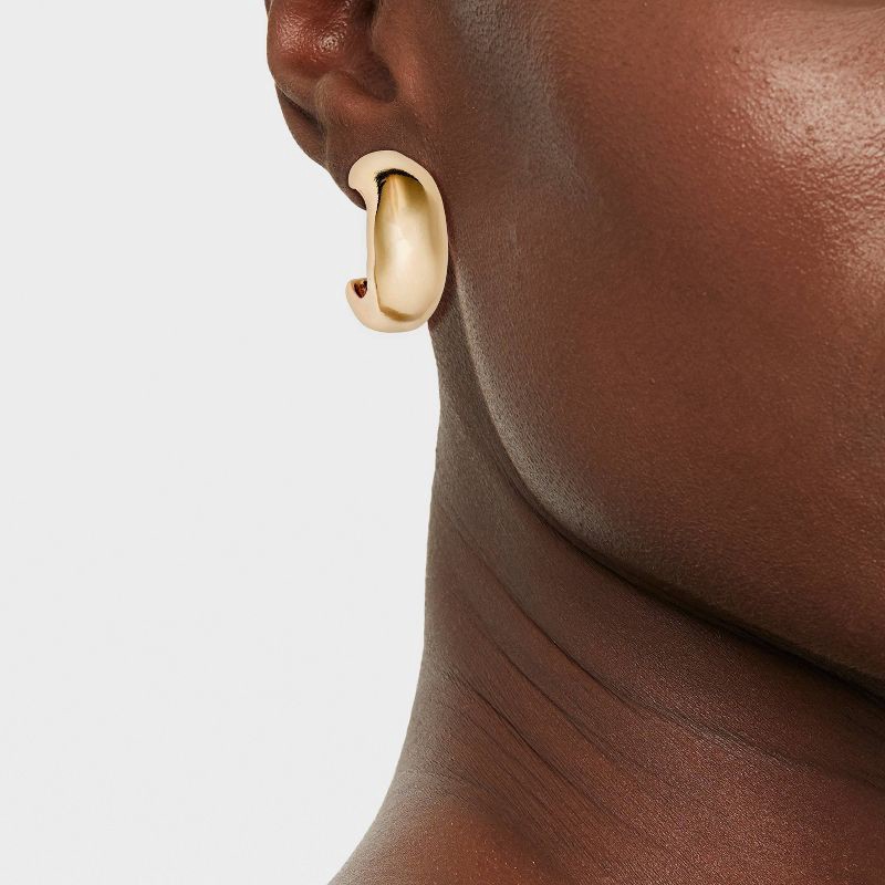 slide 2 of 3, Puffy Hoop Earrings - A New Day™ Gold: Nickel-Free Metal, Zinc, Post Closure, 1.14" Length, 0.78 oz Weight, 0.78 oz