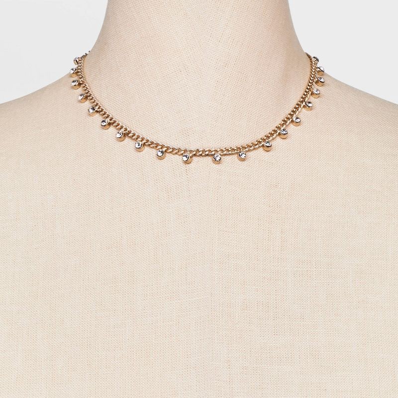 slide 3 of 5, Crystal Station Cubic Zirconia Chain Necklace - A New Day™ Gold: Steel, Lobster Claw Clasp, 3 Inch Extender, 1 ct