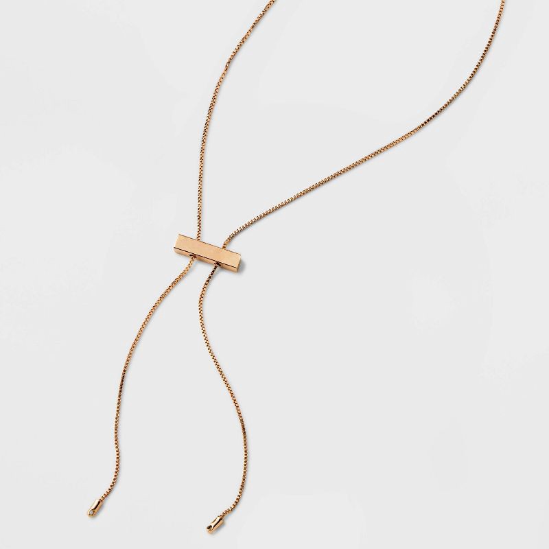 slide 1 of 4, Slider Bar Bolo Tie Y-Line Necklace - Universal Thread™ Gold: Lobster Claw Clasp, 18" Length, Recycled Brass, 1 ct