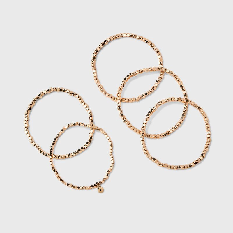 slide 3 of 4, Beaded Stretch Bracelet Set 5pc - Universal Thread™ Gold: Recycled Brass, One Size, Beaded & Stretch Design, 5 ct