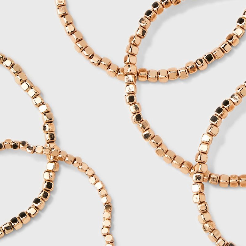 slide 4 of 4, Beaded Stretch Bracelet Set 5pc - Universal Thread™ Gold: Recycled Brass, One Size, Beaded & Stretch Design, 5 ct