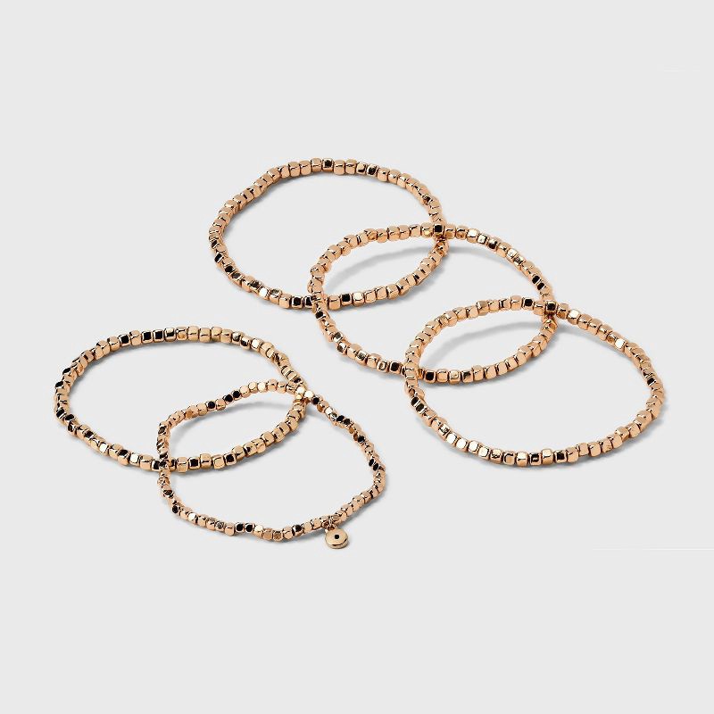 slide 1 of 4, Beaded Stretch Bracelet Set 5pc - Universal Thread™ Gold: Recycled Brass, One Size, Beaded & Stretch Design, 5 ct