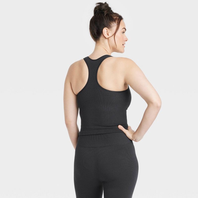 slide 4 of 5, Women's Seamless Racerback Ribbed Tank Top - All In Motion™ Black M: Moisture Wicking, Built-in Shelf Bra, 1 ct