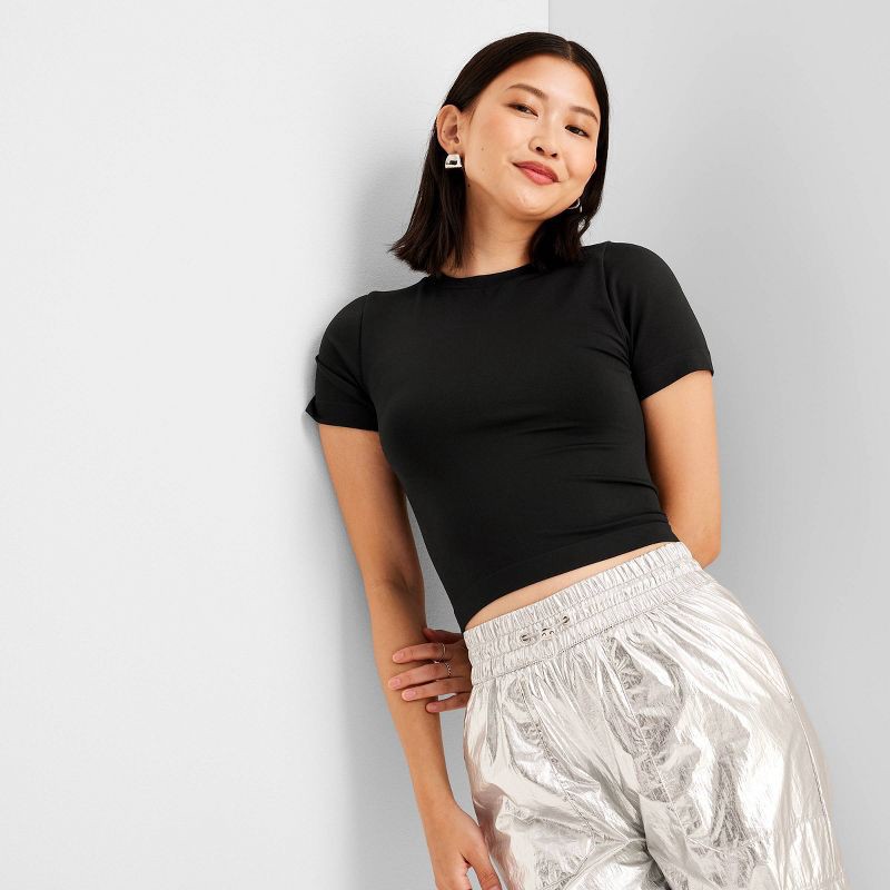 slide 3 of 3, Women's Slim Fit Short Sleeve Seamless Baby T-Shirt - A New Day™ Black XS: Lightweight Nylon-Spandex Pullover, Crew Neck Jersey, 1 ct