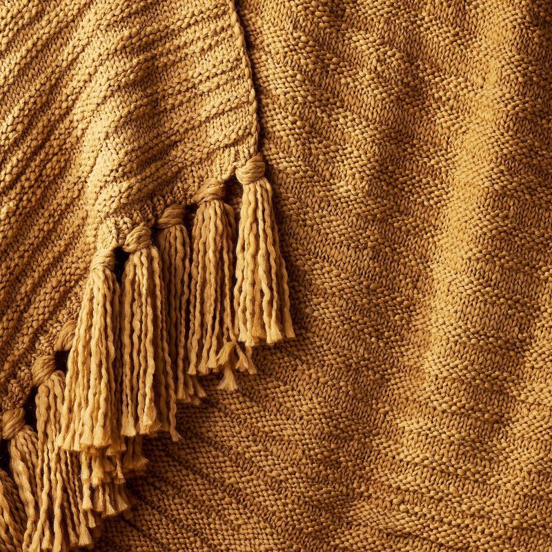 slide 3 of 3, Threshold designed w/Studio McGee Raised Striped Chunky Knit Throw Blanket Dark Tan - Threshold™ designed with Studio McGee: Cozy, Midweight, Decorative Tassels, 1 ct