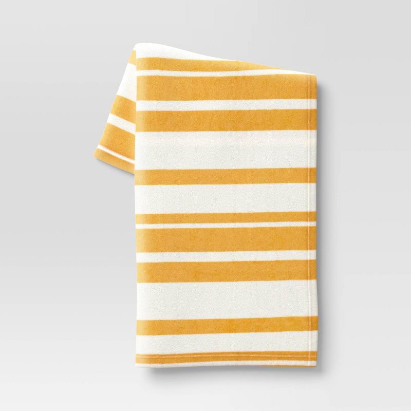 slide 1 of 4, Printed Plush Striped Throw Blanket Yellow - Room Essentials™: Cozy, Soft, Midweight, Machine Washable, 1 ct