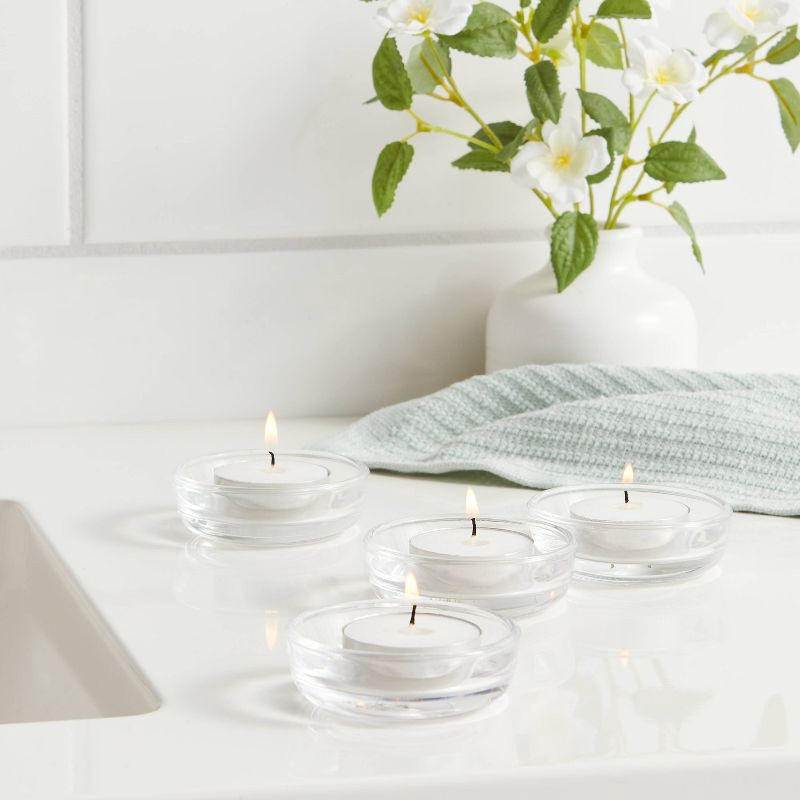 slide 2 of 3, 100ct Unscented Tea Lights Candle White - Room Essentials™: Bulk Pack for Candlelit Ambiance, 4hr Burn Time, 100 ct