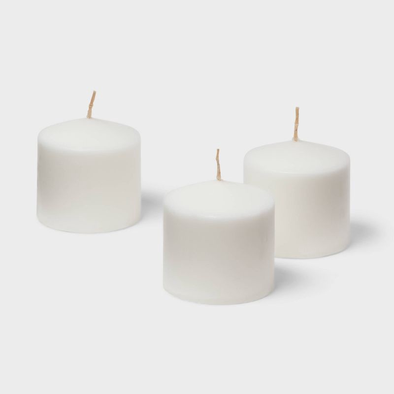 slide 3 of 3, 3" x 3" 3pk Unscented Pillar Candle Set White - Room Essentials™: Paraffin Wax, Indoor Use, 90-Hour Burn Time, 3 ct