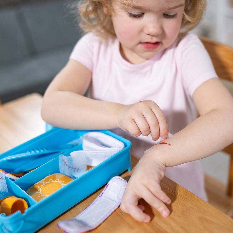 slide 5 of 9, Melissa & Doug Boo-Boos & Bandages Reusable First Aid Pretend Play Set: Creativity Focus with Medical Accessories, 1 ct