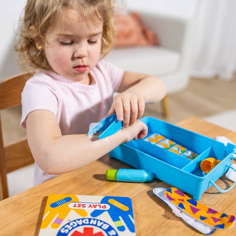 slide 6 of 9, Melissa & Doug Boo-Boos & Bandages Reusable First Aid Pretend Play Set: Creativity Focus with Medical Accessories, 1 ct
