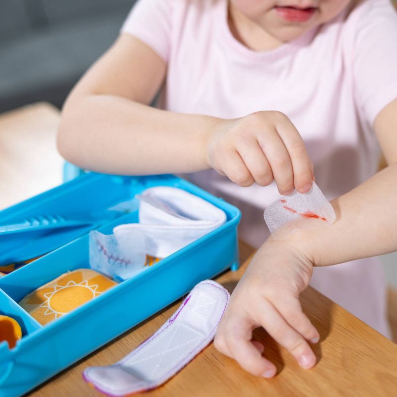 slide 7 of 9, Melissa & Doug Boo-Boos & Bandages Reusable First Aid Pretend Play Set: Creativity Focus with Medical Accessories, 1 ct