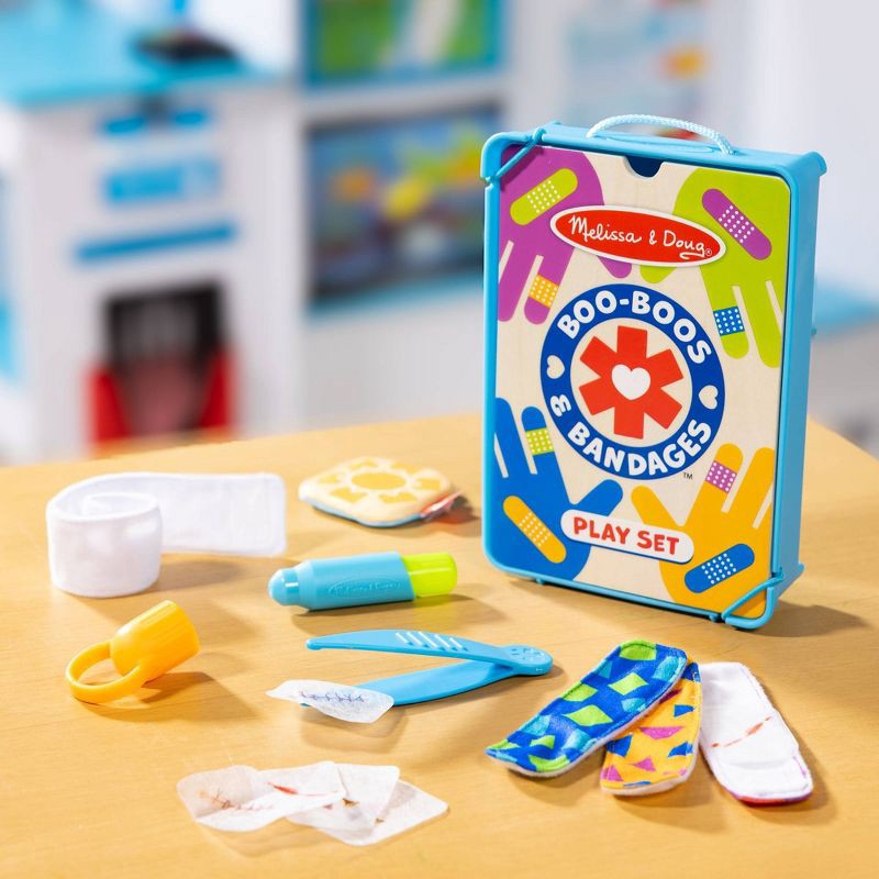 slide 9 of 9, Melissa & Doug Boo-Boos & Bandages Reusable First Aid Pretend Play Set: Creativity Focus with Medical Accessories, 1 ct