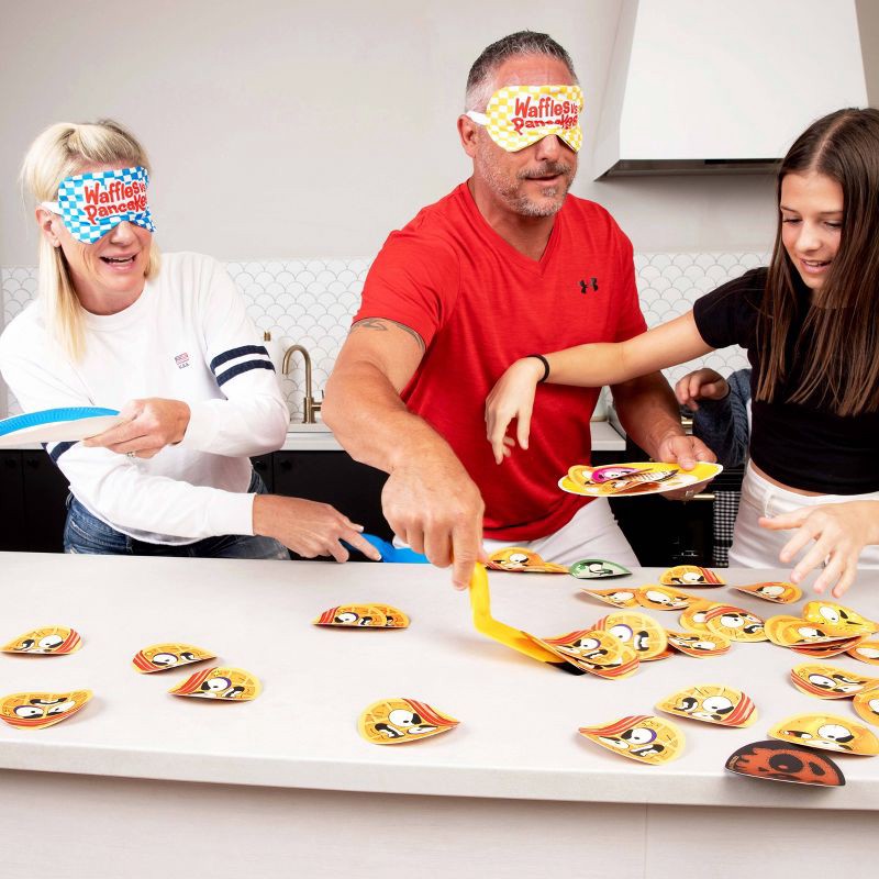 slide 7 of 11, What Do You Meme? Waffles vs Pancakes Family Game, 1 ct