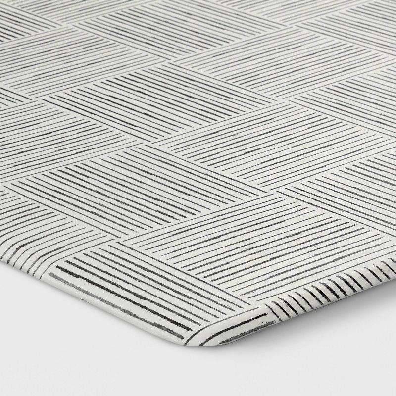 slide 3 of 4, 1'5"x2'6" Rareta Lines Comfort Mat - Threshold™: Skid-Resistant Indoor Kitchen Floor Mat, Abstract Pattern, Tan, 1 ct