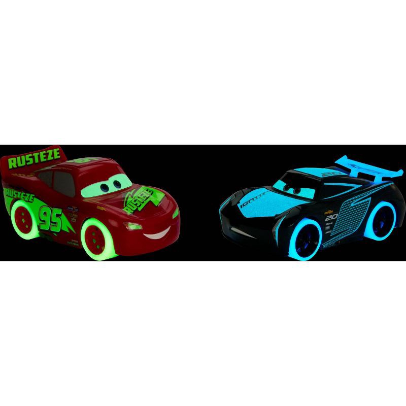 slide 2 of 6, Disney Pixar Cars Track Talkers Glow Racers Lightning McQueen & Jackson Storm - 2pk (Target Exclusive), 2 ct