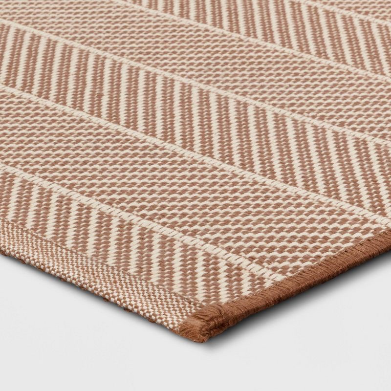 slide 4 of 4, 4'x5'6" Chevron Striped Area Rug Ivory/Tan - Room Essentials™, 1 ct