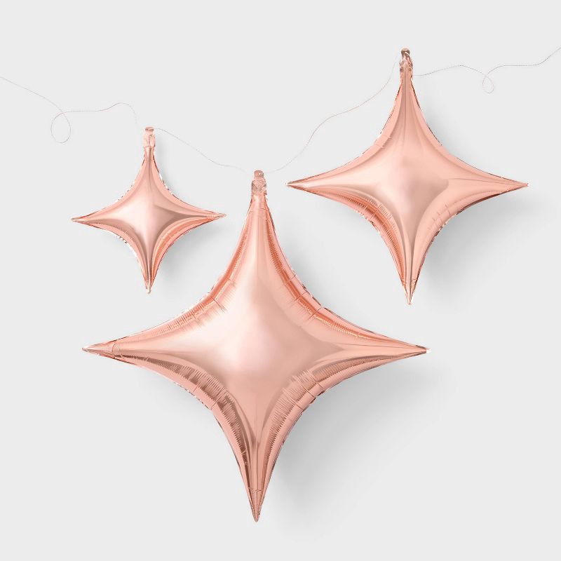 slide 1 of 7, 3ct Rose Gold Quadrangle Star Shaped Foil Balloons - Spritz™, 3 ct