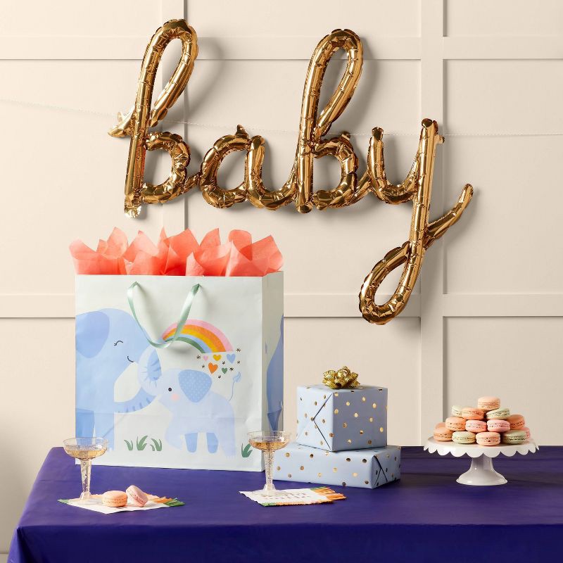 slide 2 of 5, "baby" Script Foil Balloon Banner Gold - Spritz™, 1 ct