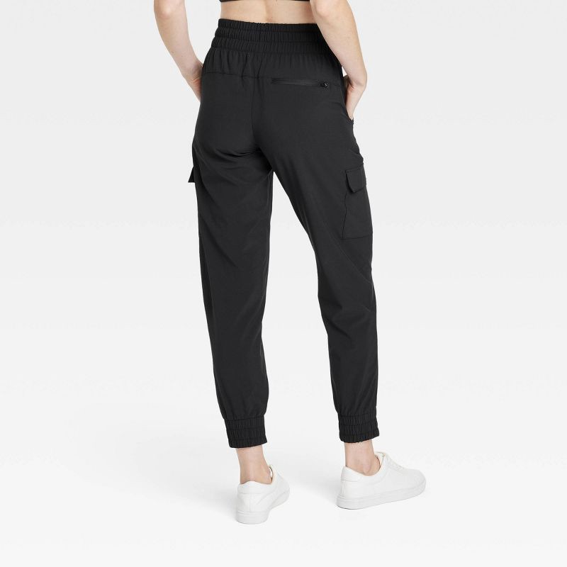 slide 2 of 5, Women's Active Light Mid-Rise Cargo Jogger Pants - All In Motion™ Black XL, 1 ct