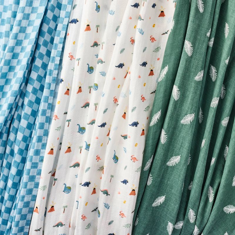 slide 3 of 4, Muslin Swaddle Baby Blanket - Dino Check - 3pk - Cloud Island™, 3 ct